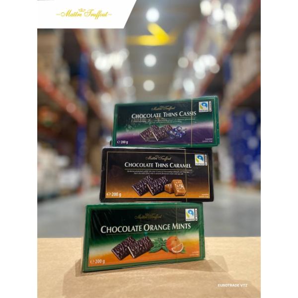 Maitre Troffout Mints (Мʼята) 200 g, Maitre Troffout Orange & Mints (Апельсин та Мʼята) 200 g, Maitre Troffout Caramel (Карамель) 200 g, Maitre Troffout Blackcurrant (Чорниця) 200 g, Maitre Troffout та фундуком, Mozartkugeln 300 g, Maitre Troffout Mozartkugeln 200 g, Maitre Troffout Pralines 1 kg, Maitre Troffout Schokoladenpralinen 250 g, Maitre Troffout Mozart 143 g, Maitre Troffout та фундуком 300 g, Maitre Troffout Mozartsticks 200 g